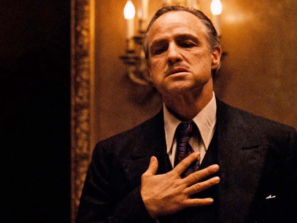 Marlon Brando é o chefe de máfia Don Vito Corleone em O Poderoso Chefão — Foto: Divulgação/IMDb