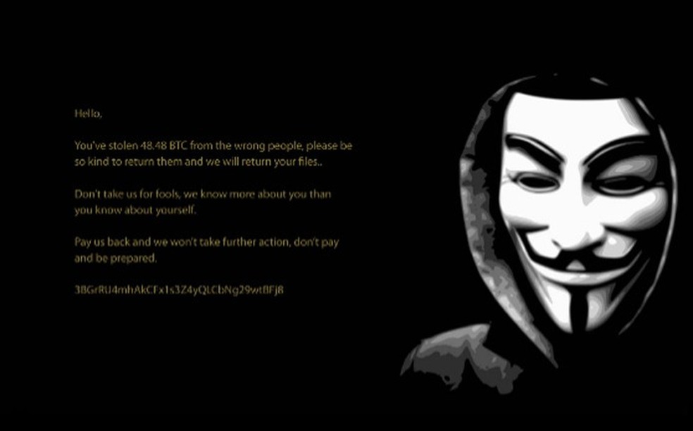 Papel de parede com a imagem de Guy Fawkes com mensagem para a vítima (Foto: Divulgação/Avast) — Foto: TechTudo