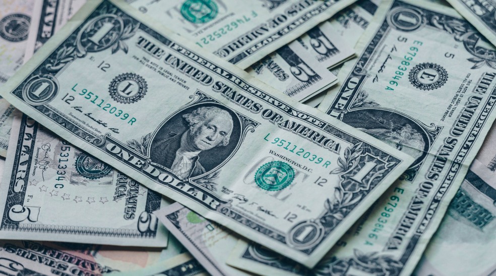Lista reúne 5 sites para acompanhar a cotação do dólar; confira — Foto: Reprodução/Canva