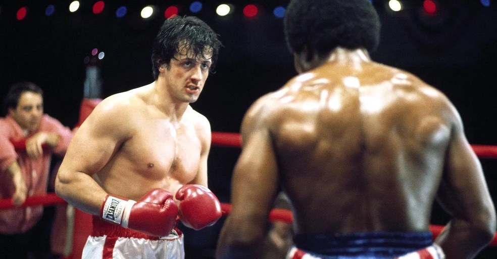 Rocky alavancou a carreira do astro Sylvester Stallone, que chegou a ganhar o Oscar de Melhor Roteiro pela obra — Foto: Reprodução/IMDb